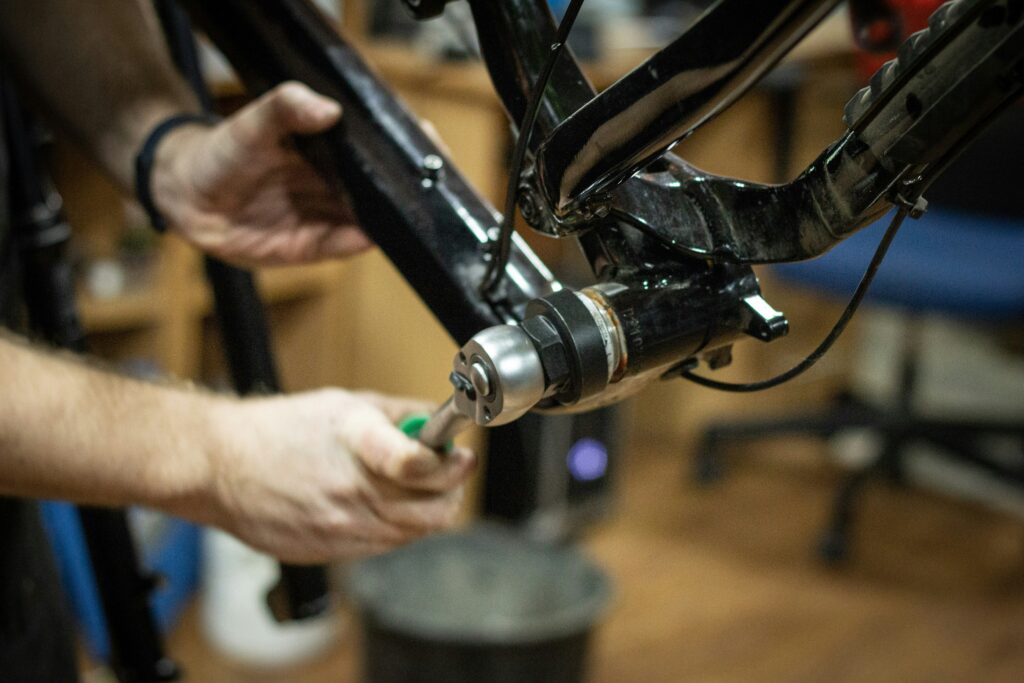 Mechanic tightening bottom bracket